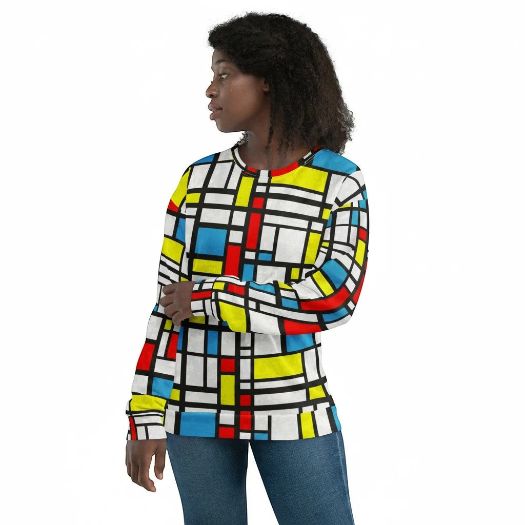 65mcmlxv women's long-sleeve sweatshirt with a Mondrian-inspired color block print in red, blue, yellow, and white. Made from a polyester blend.