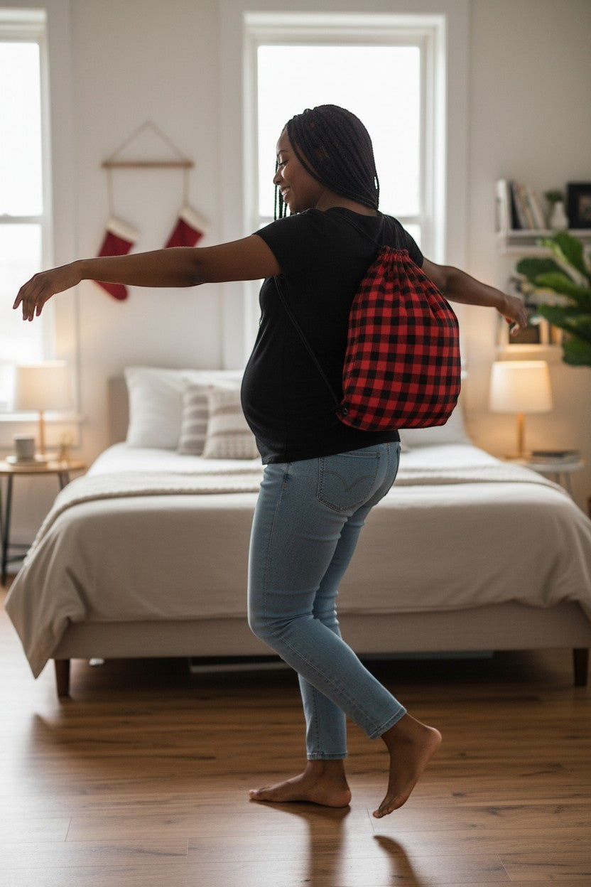 65mcmlxv red buffalo plaid print linen drawstring sack bag worn by a pregnant woman