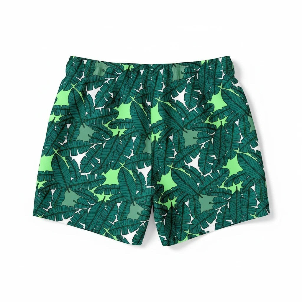 65mcmlxv Men's green banana leaf print swim trunks with drawstring and mesh lining.