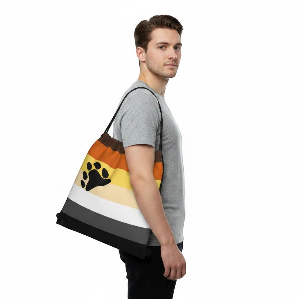 65mcmlxv Bear Pride flag print drawstring bag with black paw print, made of spun polyester.