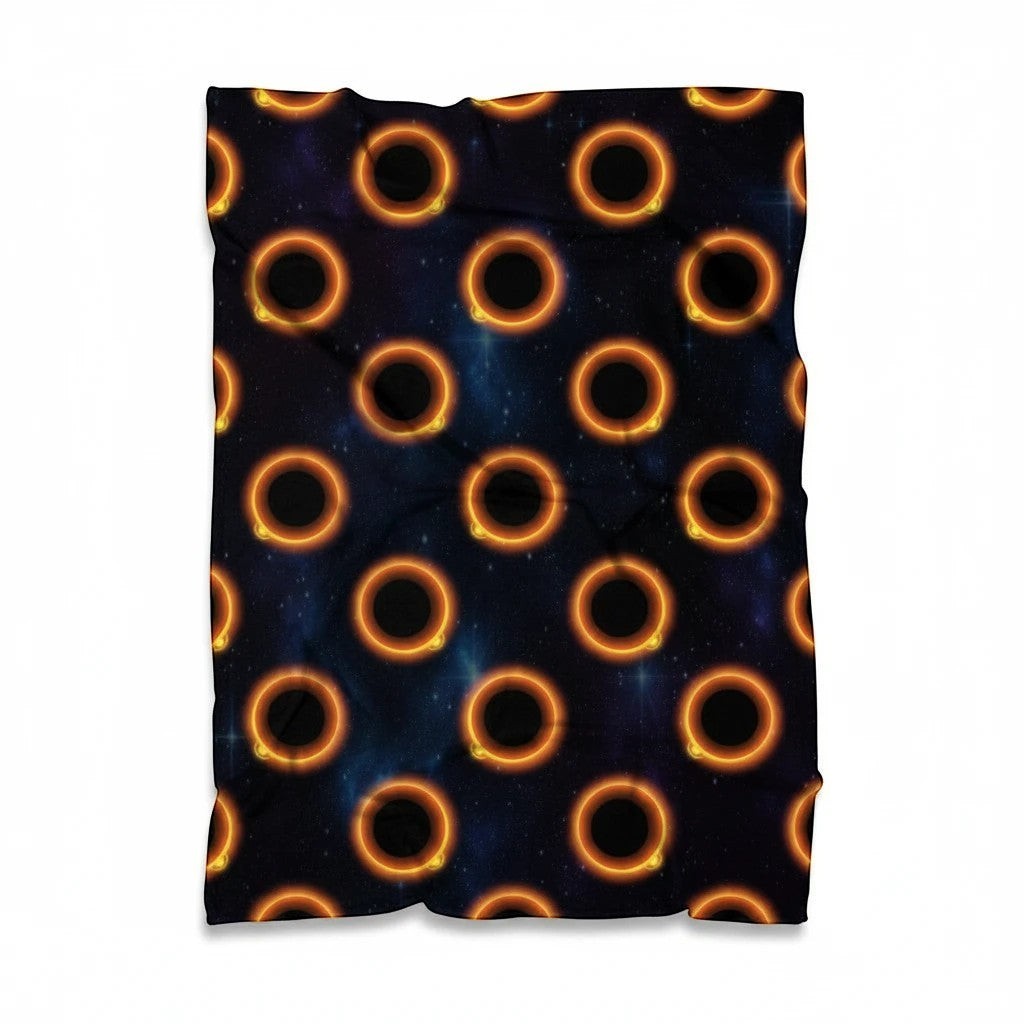 65mcmlxv black solar eclipse pattern fleece blanket with orange glowing rings and starry background.