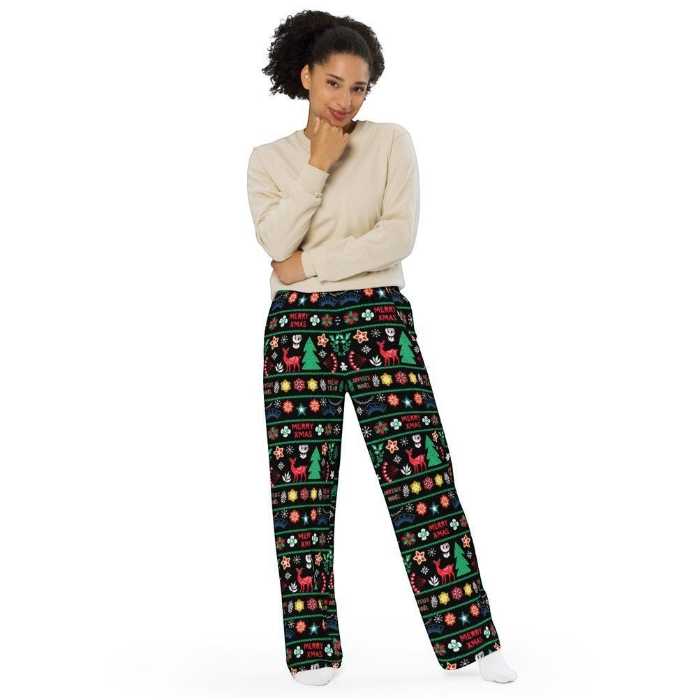 65mcmlxv black wide-leg lounge pants with a Scandinavian Nordic Christmas fairisle print featuring reindeer, trees, and snowflakes. Stretchy polyester-spandex blend.