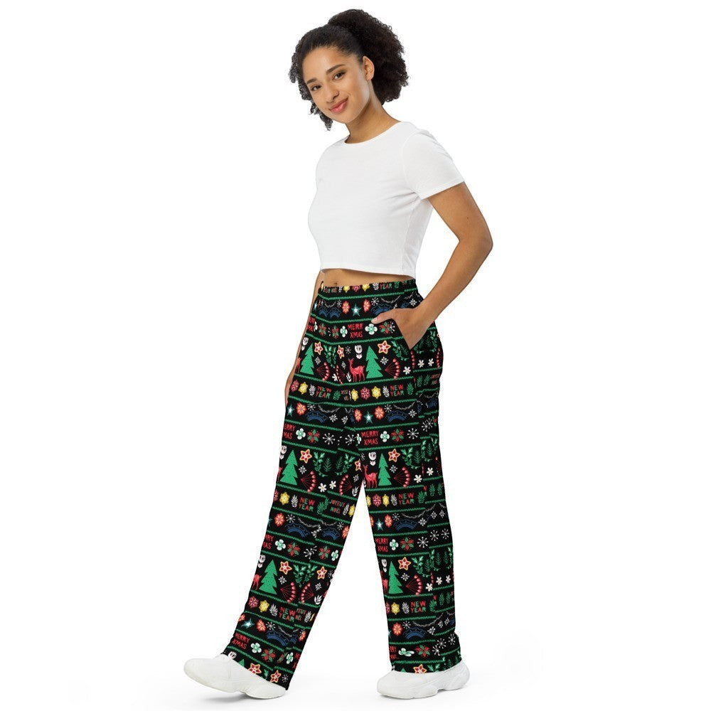 65mcmlxv black wide-leg lounge pants with a Scandinavian Nordic Christmas fairisle print featuring trees, reindeer, and snowflakes. Unisex fit.