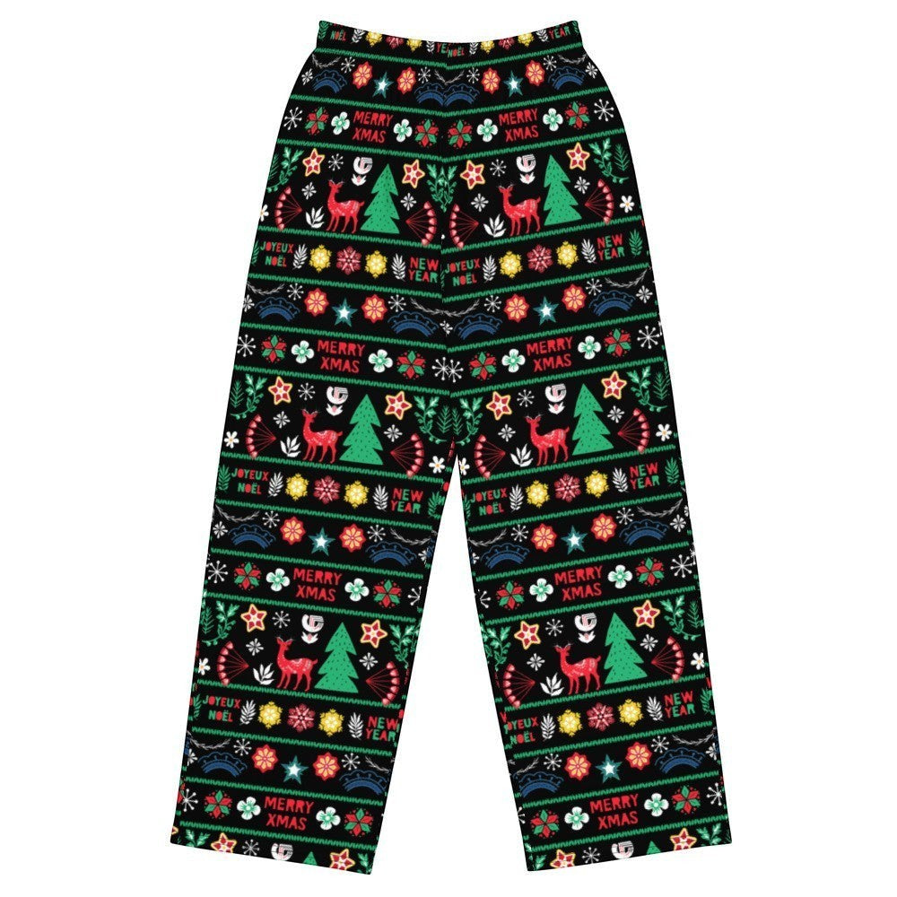 65mcmlxv unisex wide-leg lounge pants with black background and Scandinavian Nordic Christmas fairisle print featuring deer, trees, and holiday text.