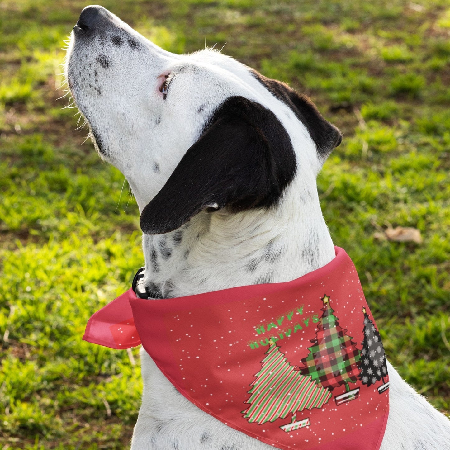 65mcmlxv red polyester pet bandana with a festive Christmas tree print and "Happy Holidays" text.