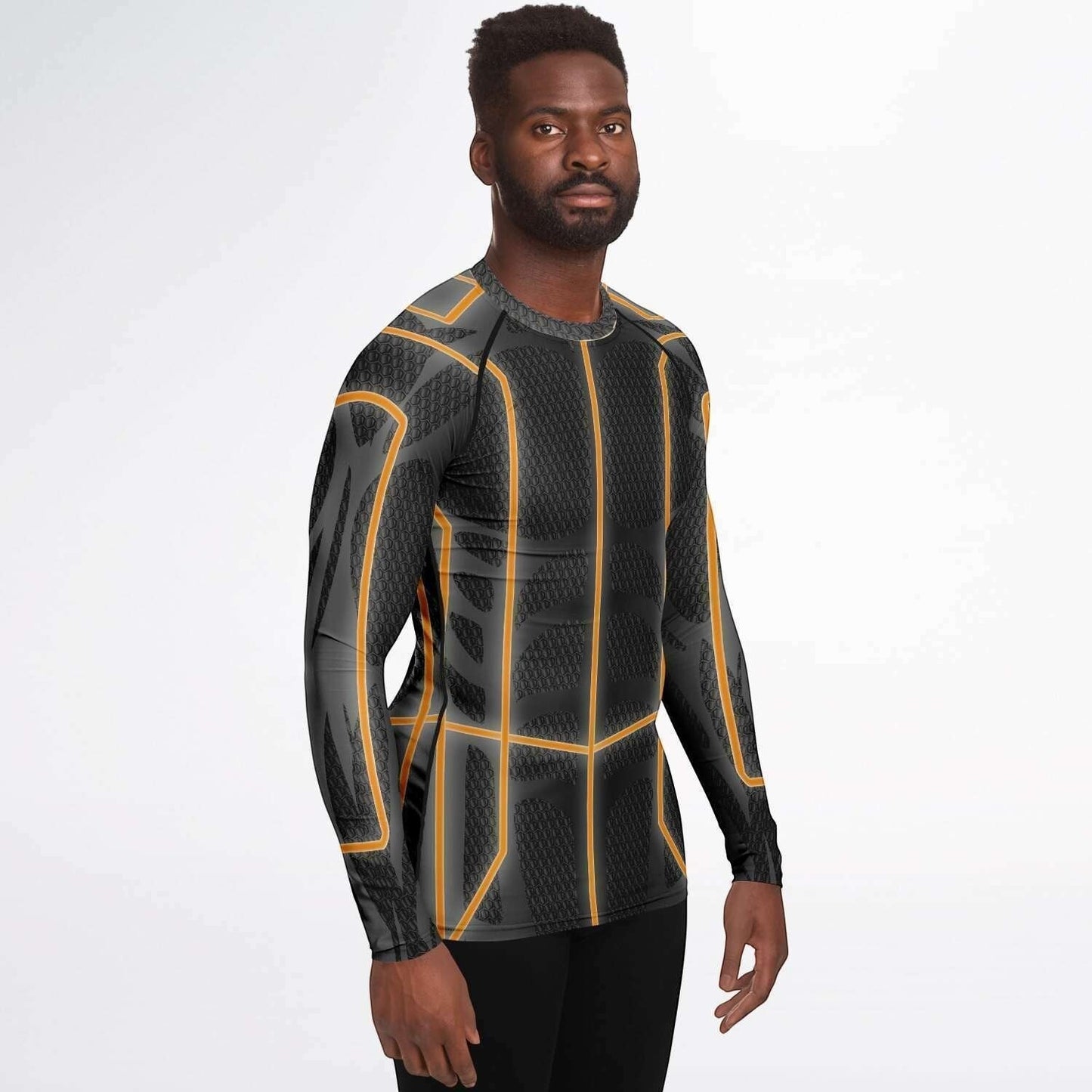65mcmlxv Men's long-sleeve rash guard top in black with orange geometric accents. UPF 50+ protection.
