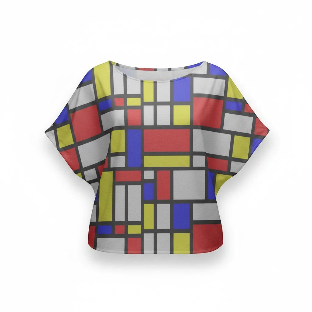 65mcmlxv women's Mondrian color block print batwing top with red, blue, yellow, and white rectangles on a grey grid.