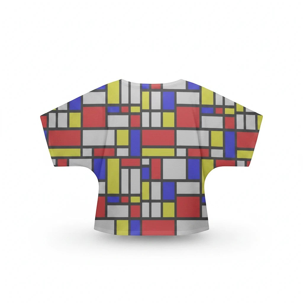 65mcmlxv women's Mondrian color block print batwing top made of poly-viscose blend with short dolman sleeves.