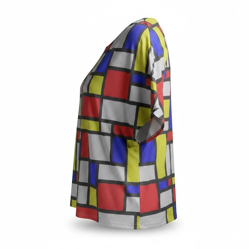 65mcmlxv women's Mondrian color block print batwing top with red, blue, yellow, and white squares on a grey background.