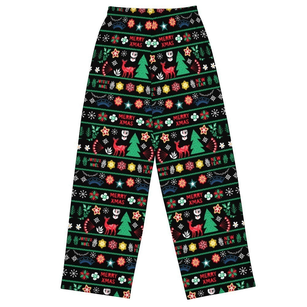 65mcmlxv black wide-leg lounge pants with a festive Scandinavian Nordic Christmas fairisle print featuring deer, trees, and "Merry Xmas" text.
