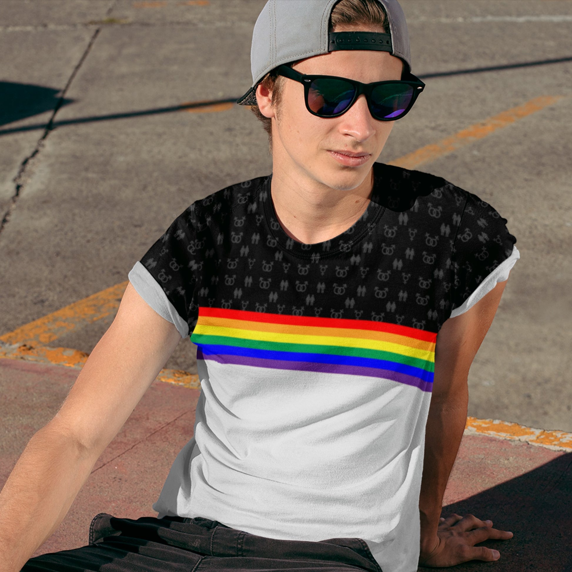65mcmlxv unisex t-shirt with rainbow stripe and subtle pride symbols on black upper chest. White lower half.