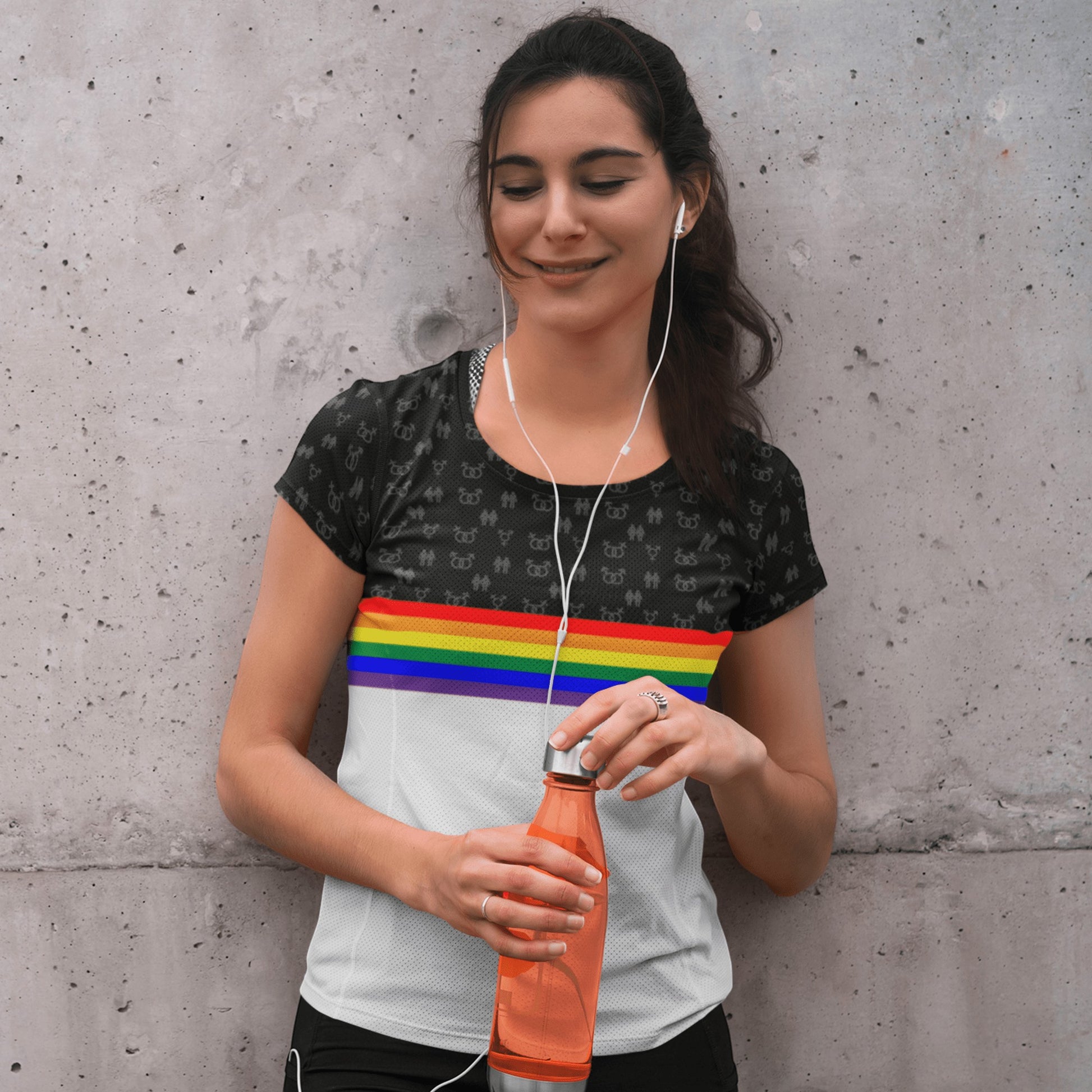 65mcmlxv Unisex t-shirt with rainbow stripe print and subtle repeating symbols on black sleeves and upper chest.