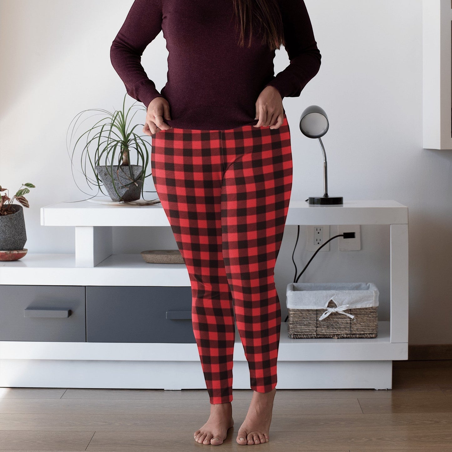 65 MCMLXV women's red and black buffalo plaid print leggings made from polyester and spandex with an elastic waistband.