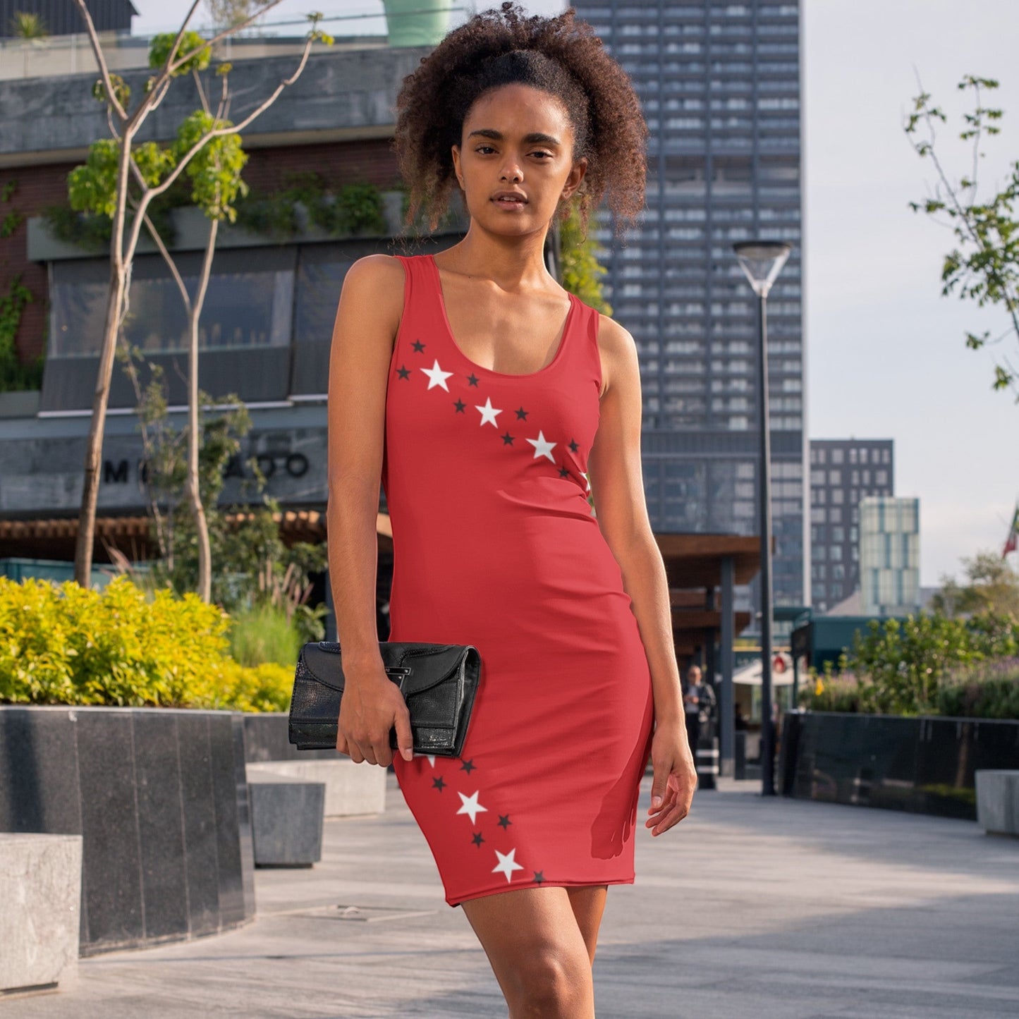 65mcmlxv red sleeveless bodycon dress with white and black star print, scoop neckline.