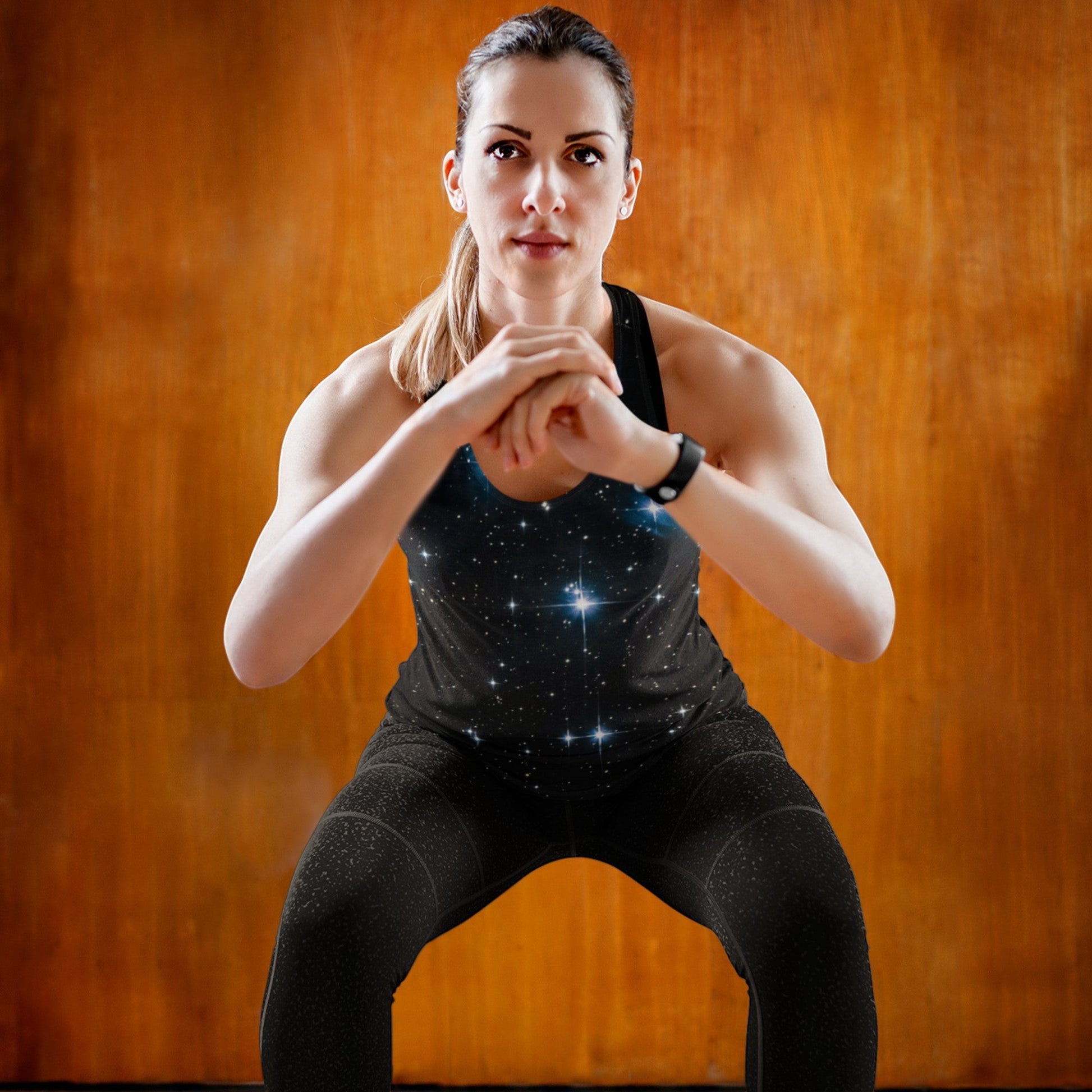 65mcmlxv Women's black tank top with all-over starry night print, ideal for cosplay or activewear.