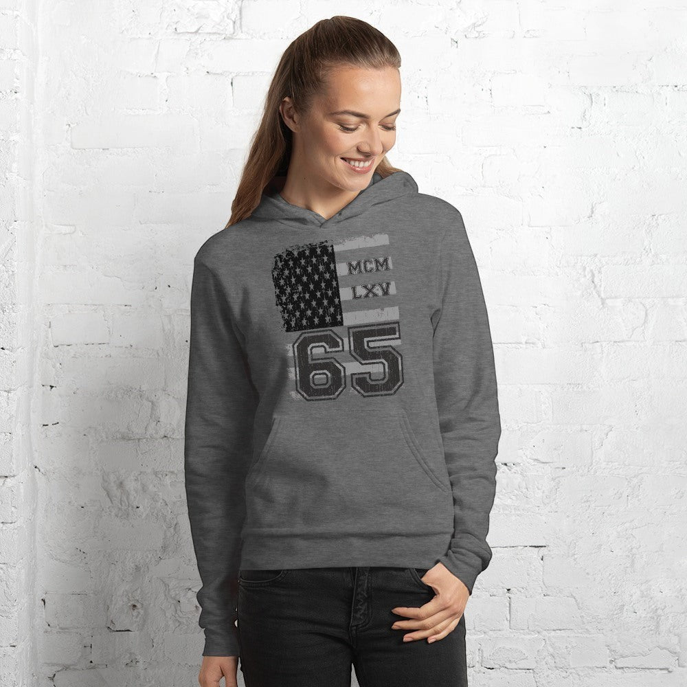 65 MCMLXV unisex grey heather pullover fleece hoodie with vintage USA flag graphic and number 65.